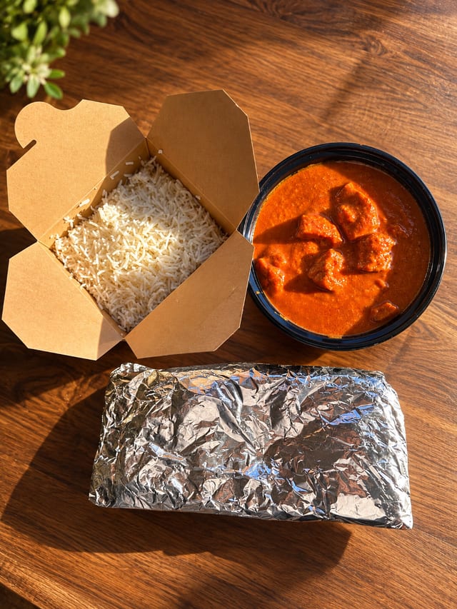 Butter Chicken w/ Garlic Naan & Rice.